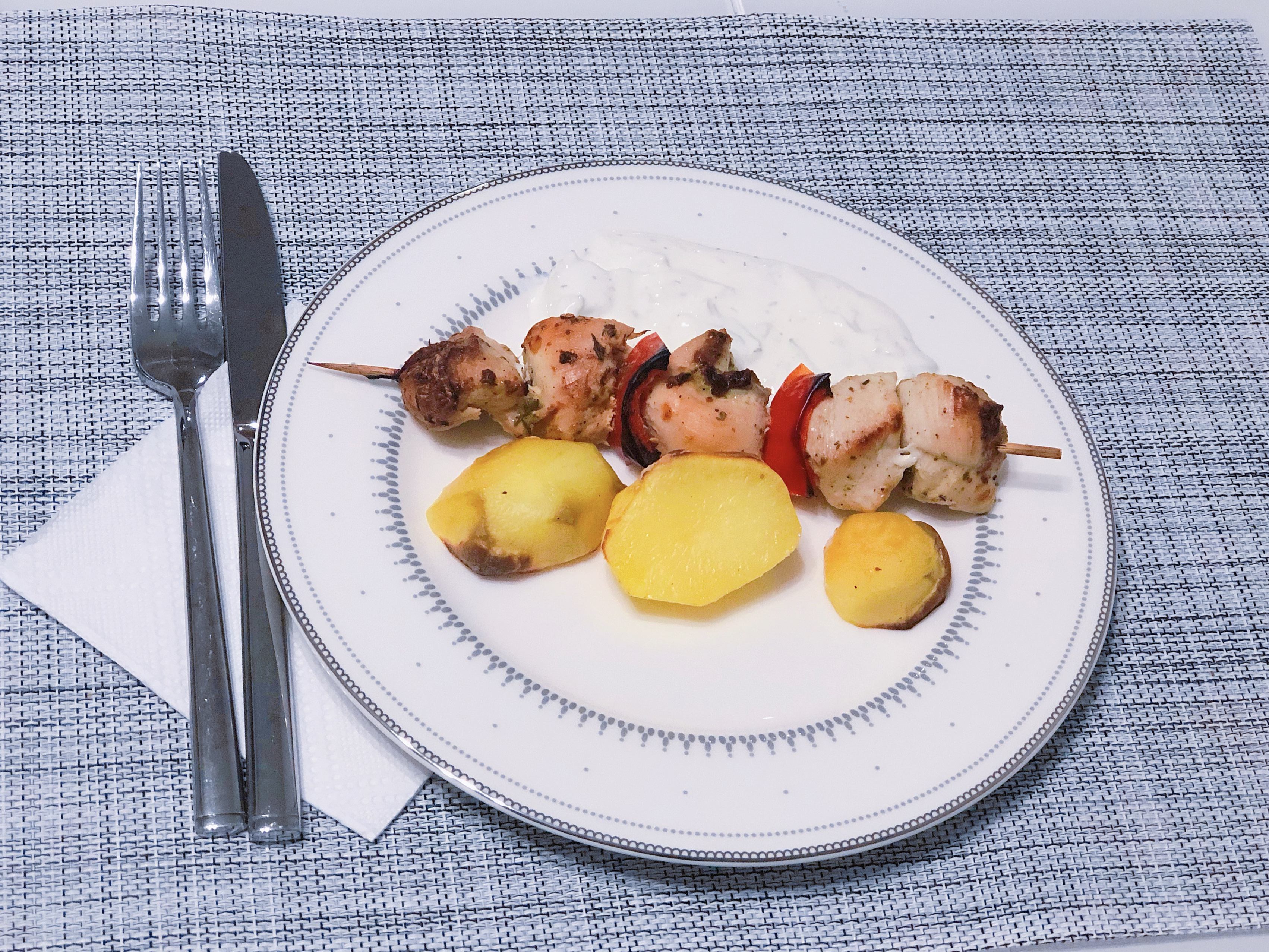 Quick dinner recipe of chicken on skewers with tzatziki sauce