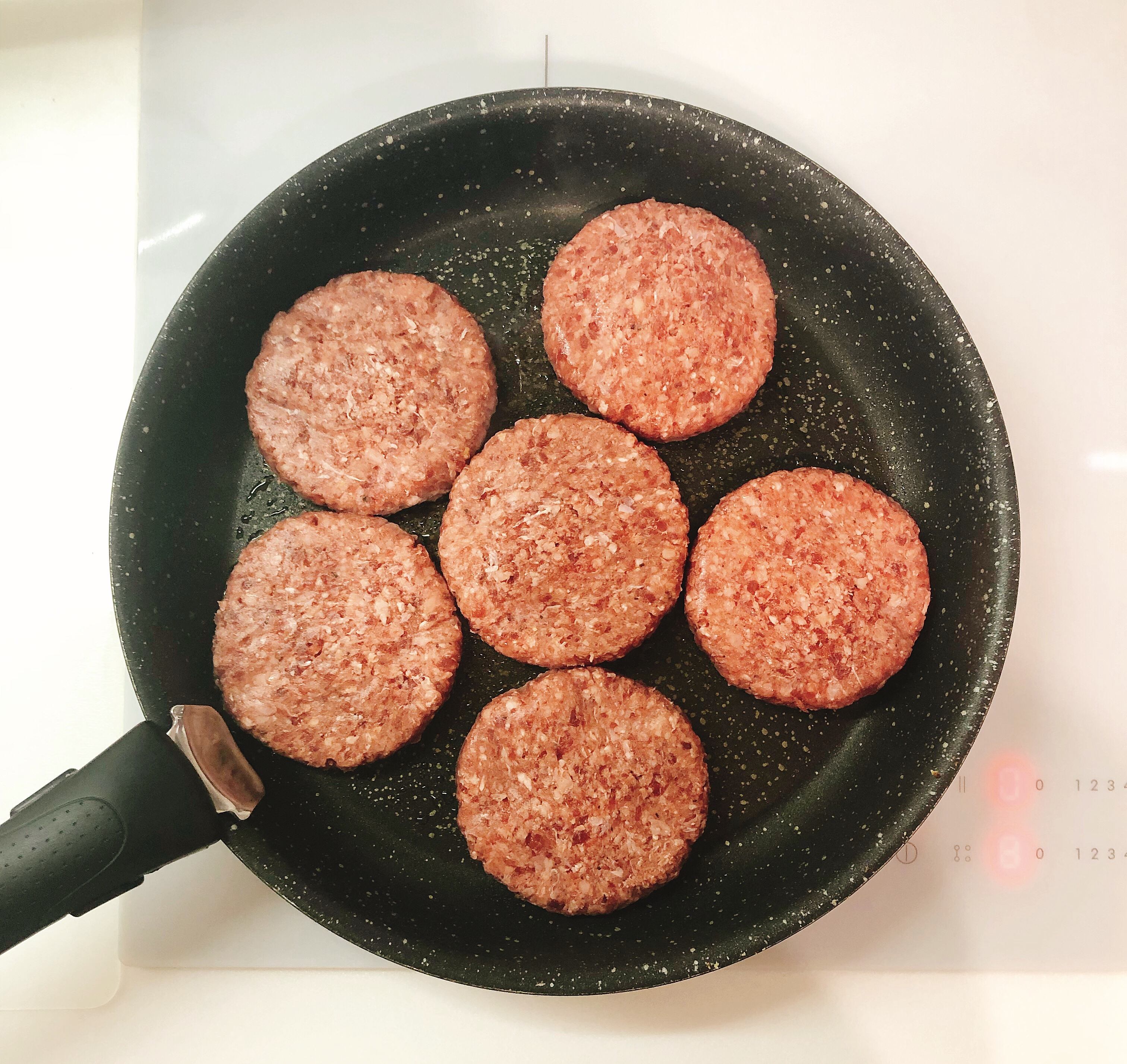 Fry burger meat on the pan
