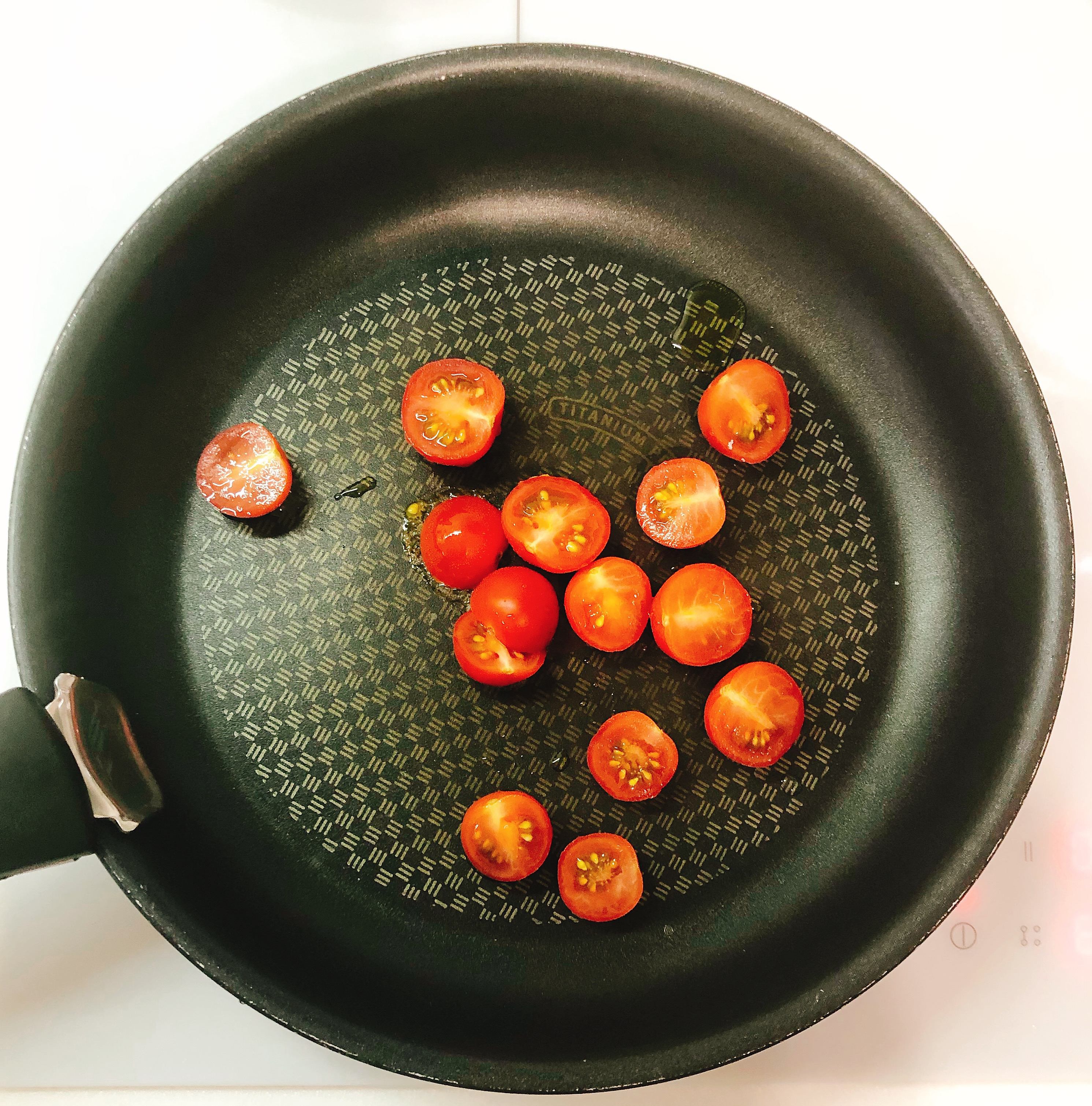 Fry cherry tomatoes