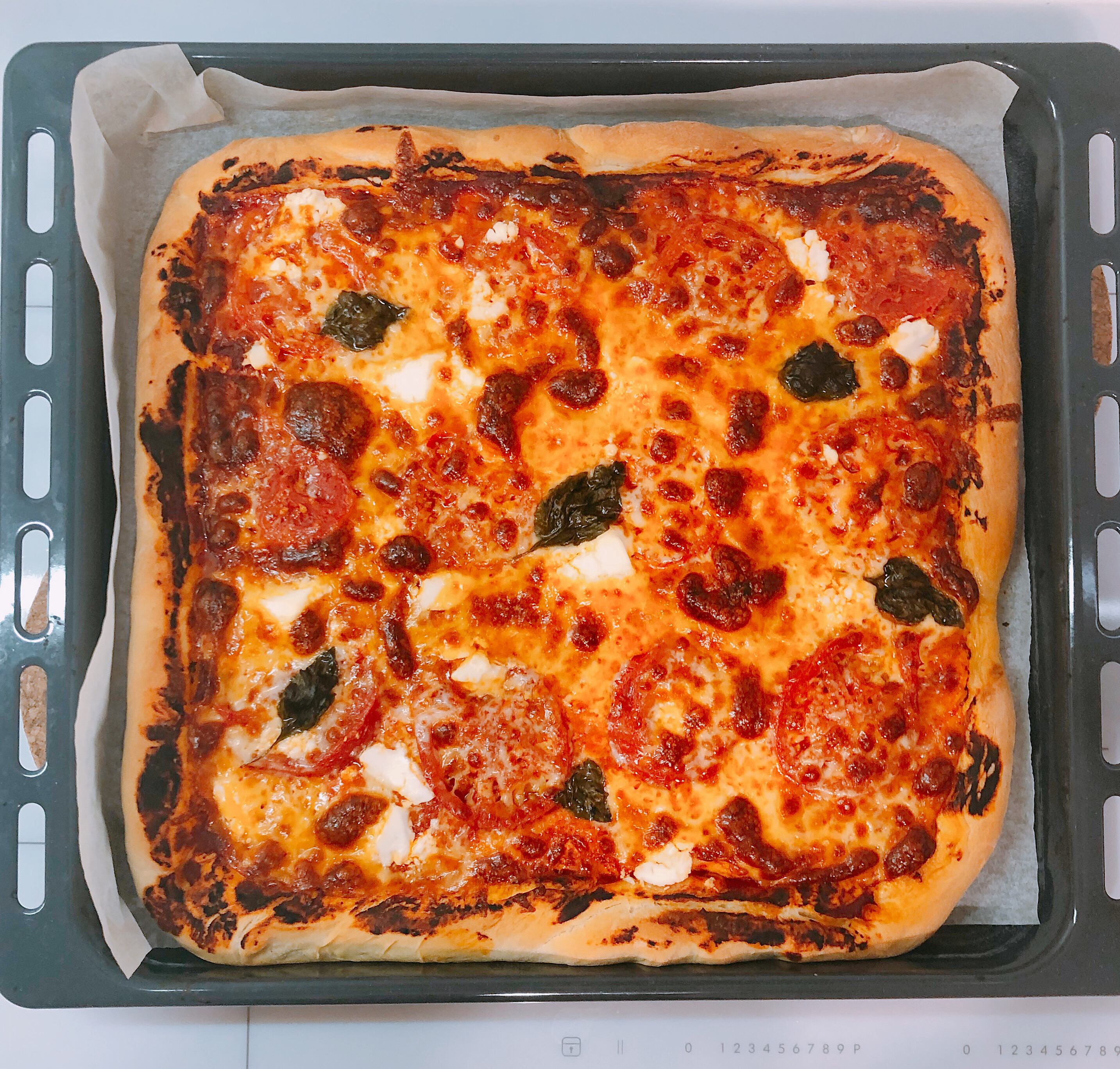 Baked Margherita pizza