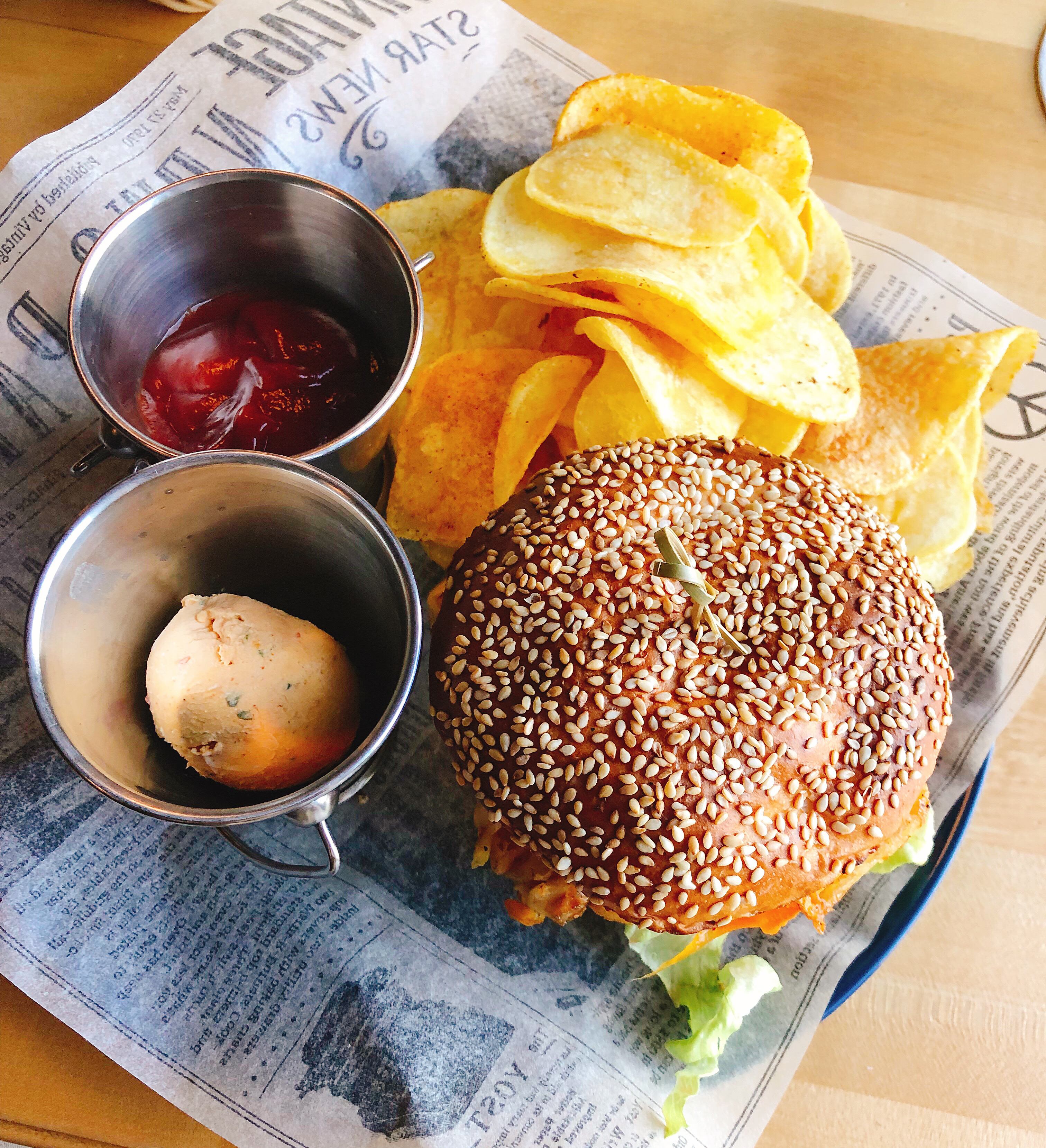 Served burger with chips