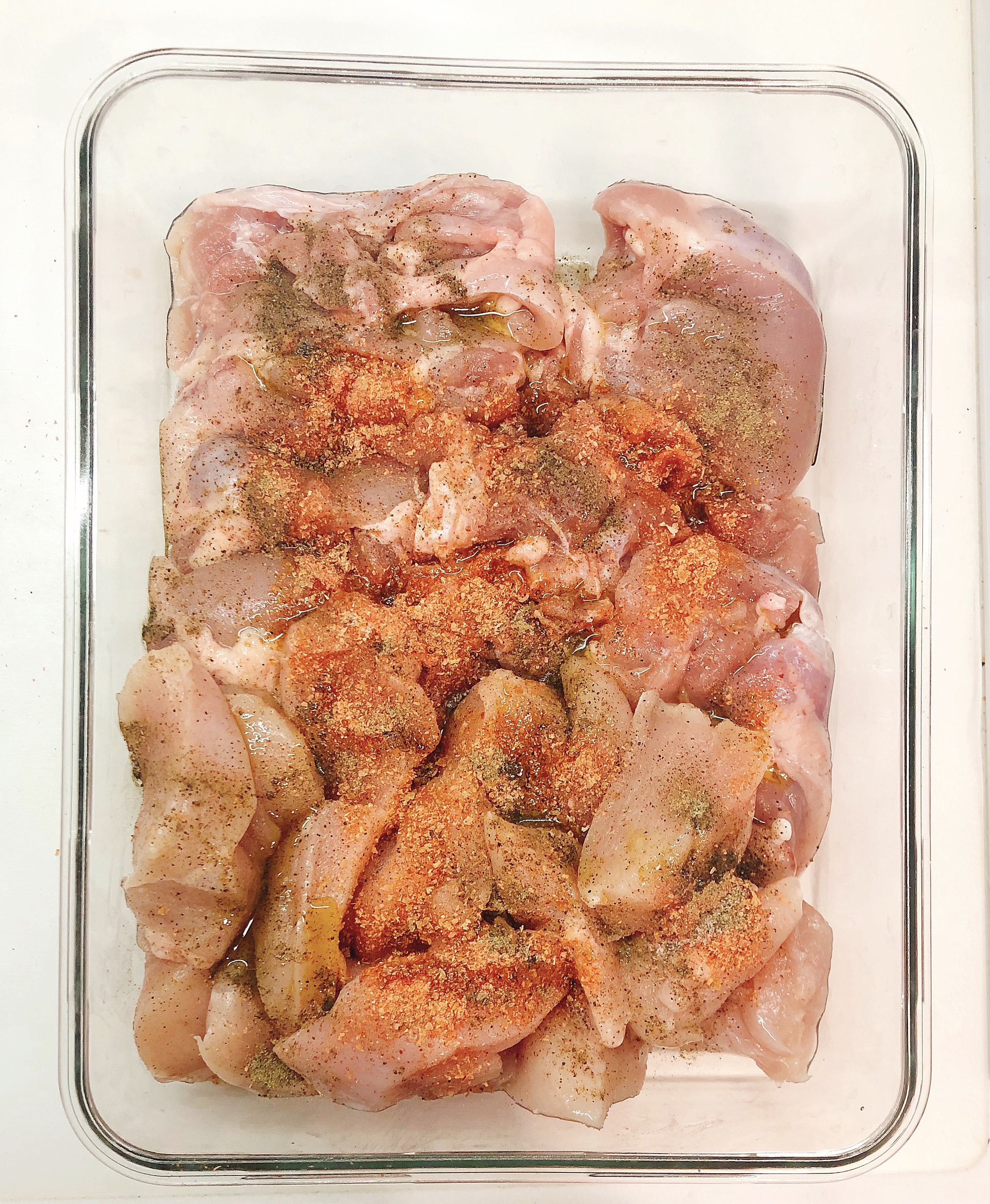 Marinade chicken with olive oil and paprika
