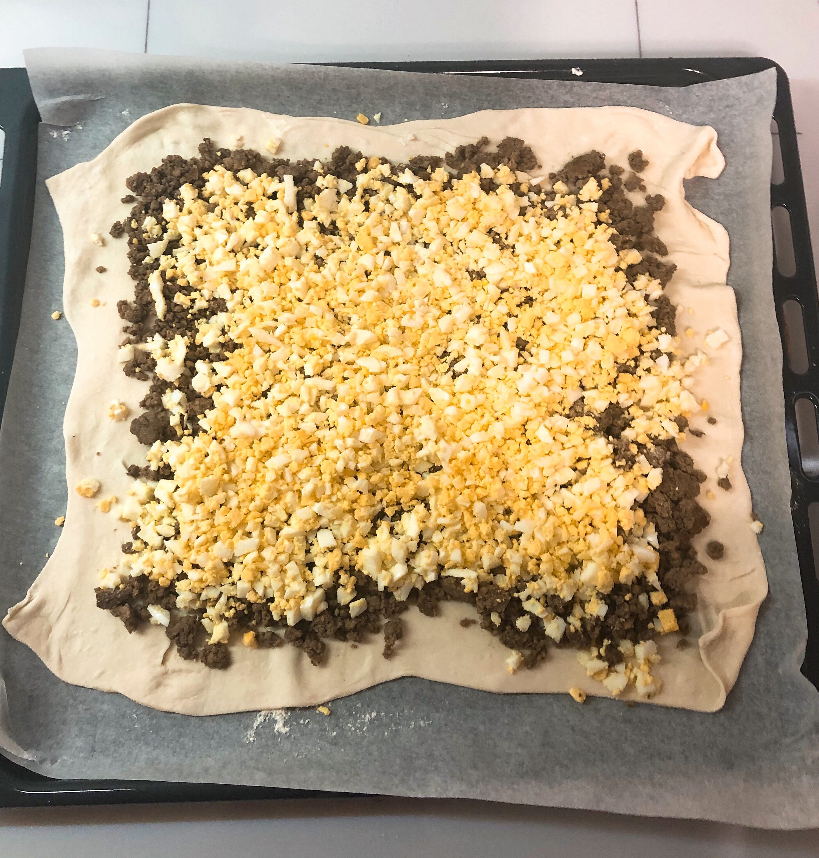 Filling for pie on the rolled out dough