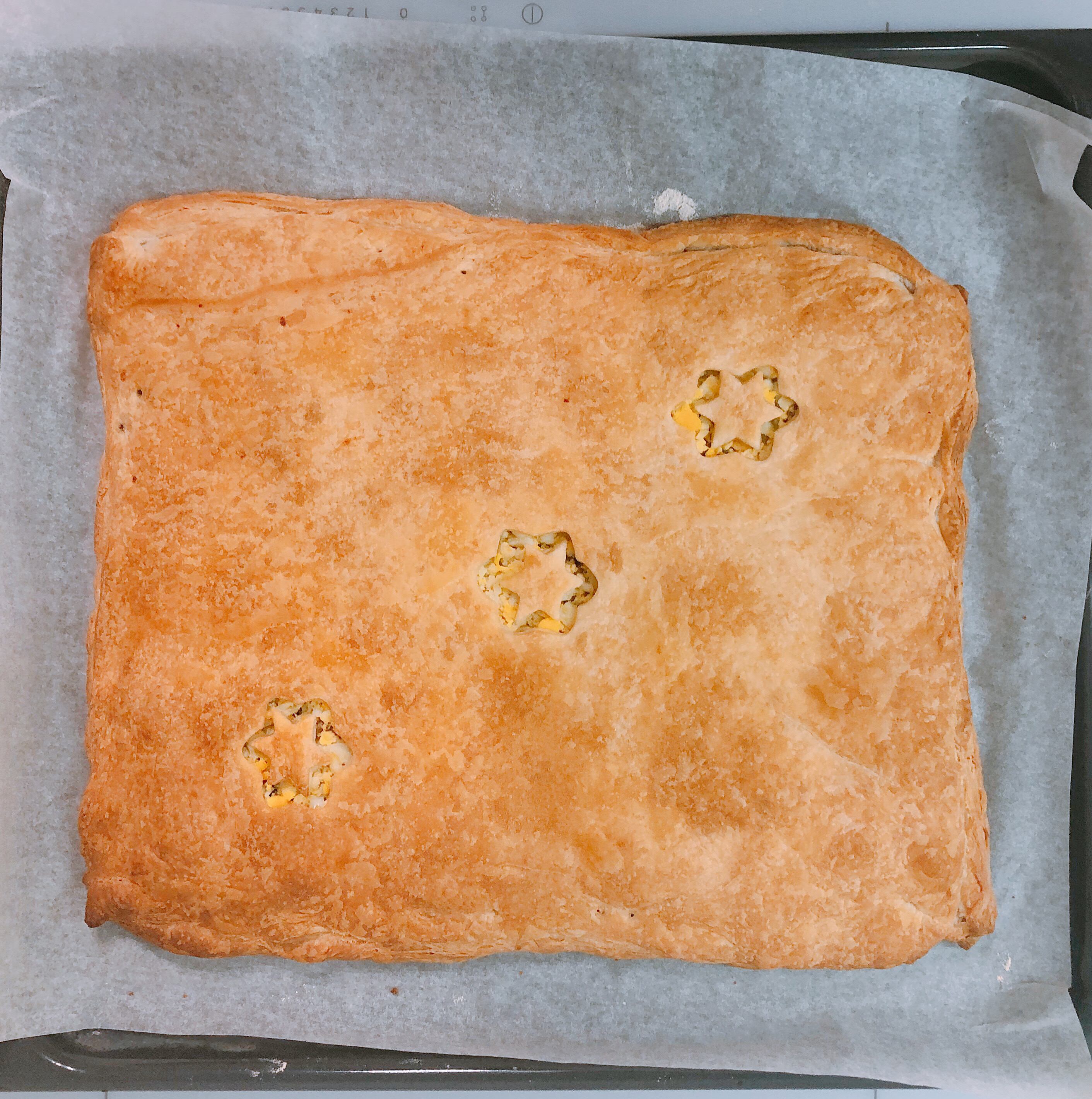 Baked pie with minced meat and eggs in the oven