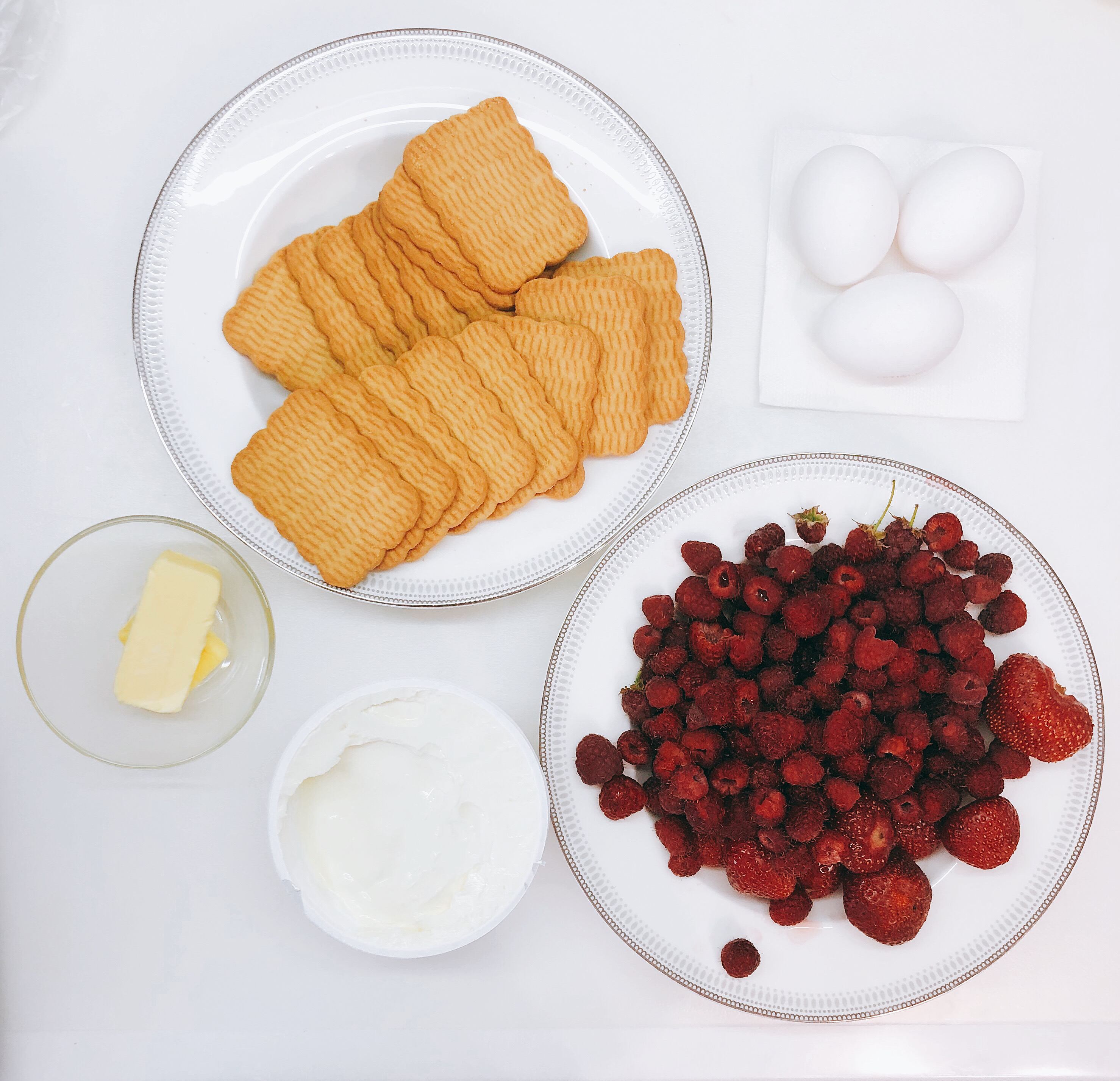 Main ingredients for cheesecake with berries