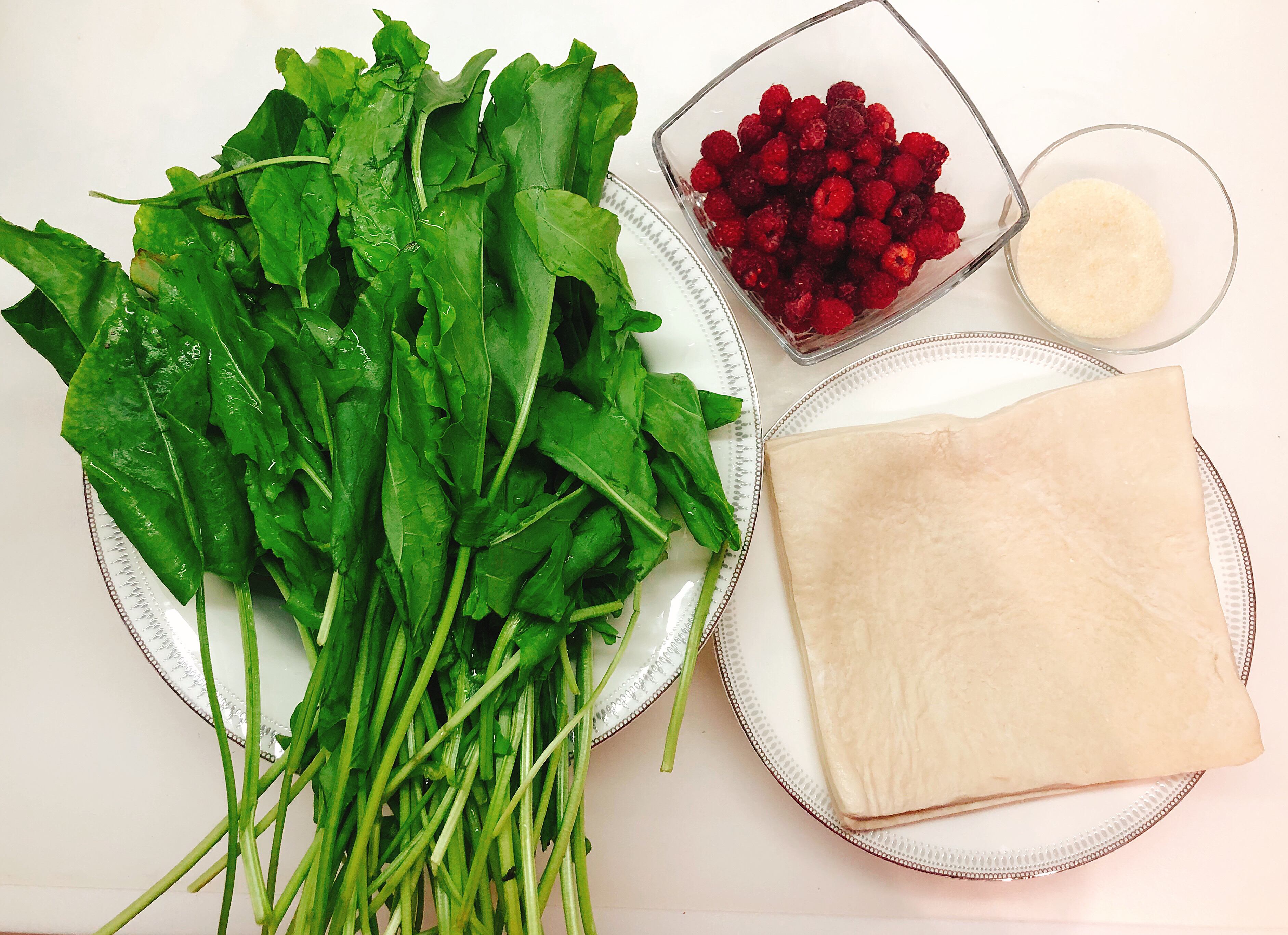 Ingredients for pie with sorrel and raspberries