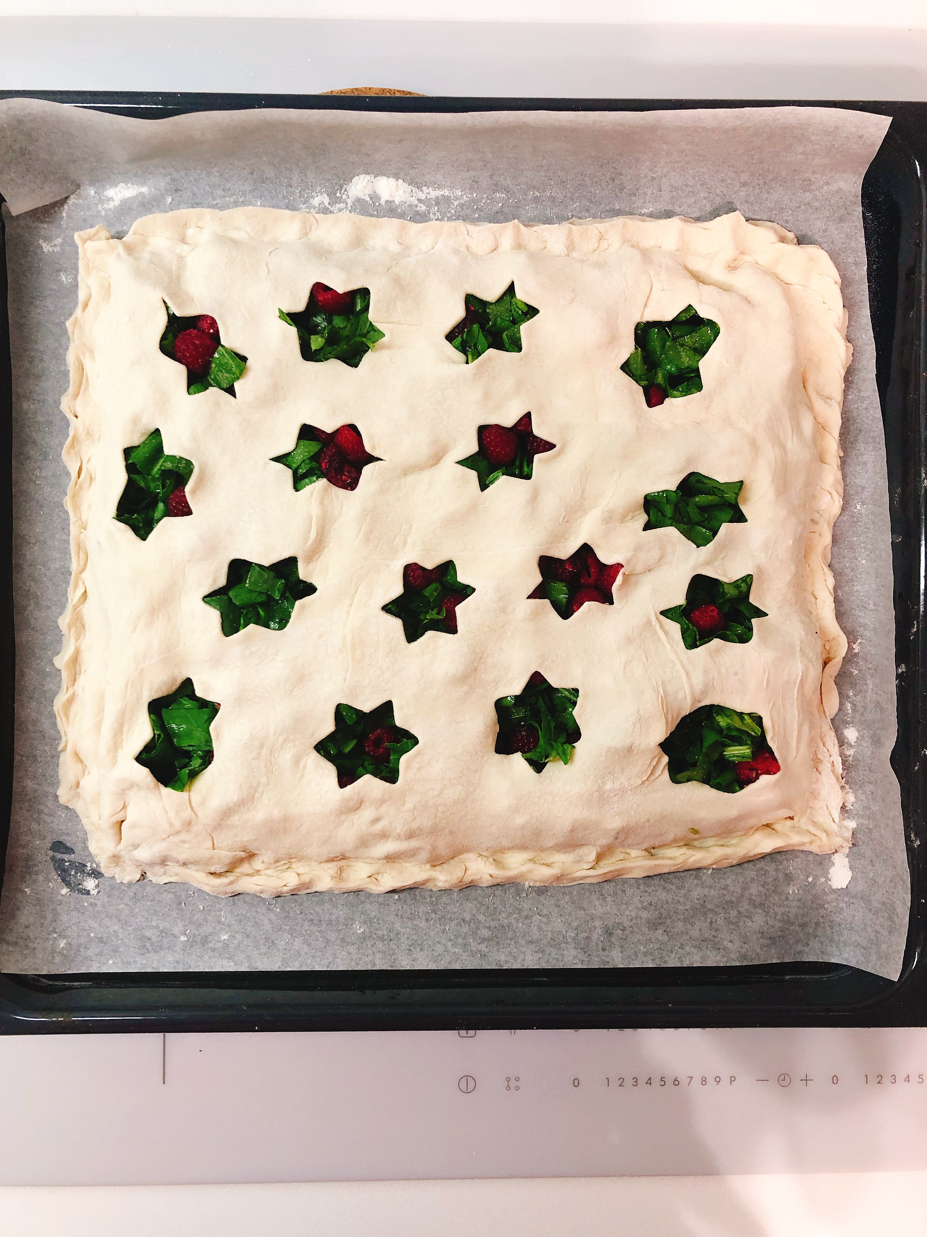 Pie with raspberry and sorrel is ready for baking