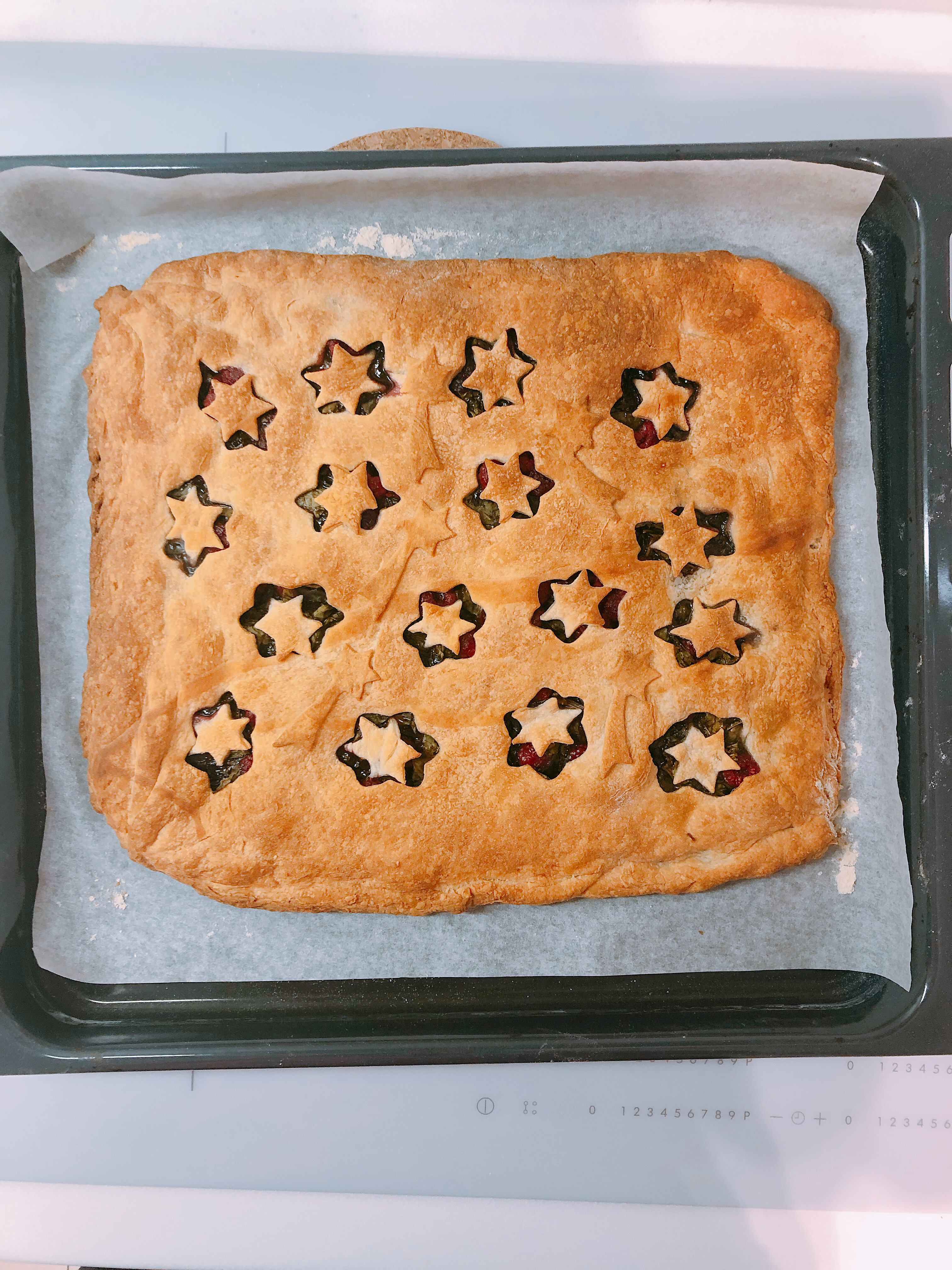 Baked pie with sorrel and raspberries